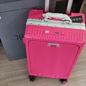 Nobl Pink Rolling Suitcase And Clear Cover